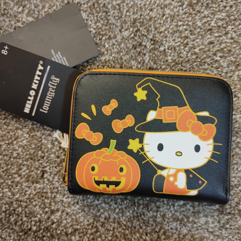 BRAND NEW, NEVER USED
Loungefly Halloween Hello Kitty Sanrio Wallet